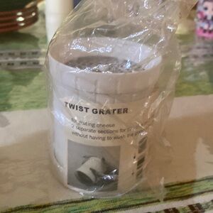 HAND HELD TWIST CHEESE GRATER WITH DUAL COMPARTMENTS, New